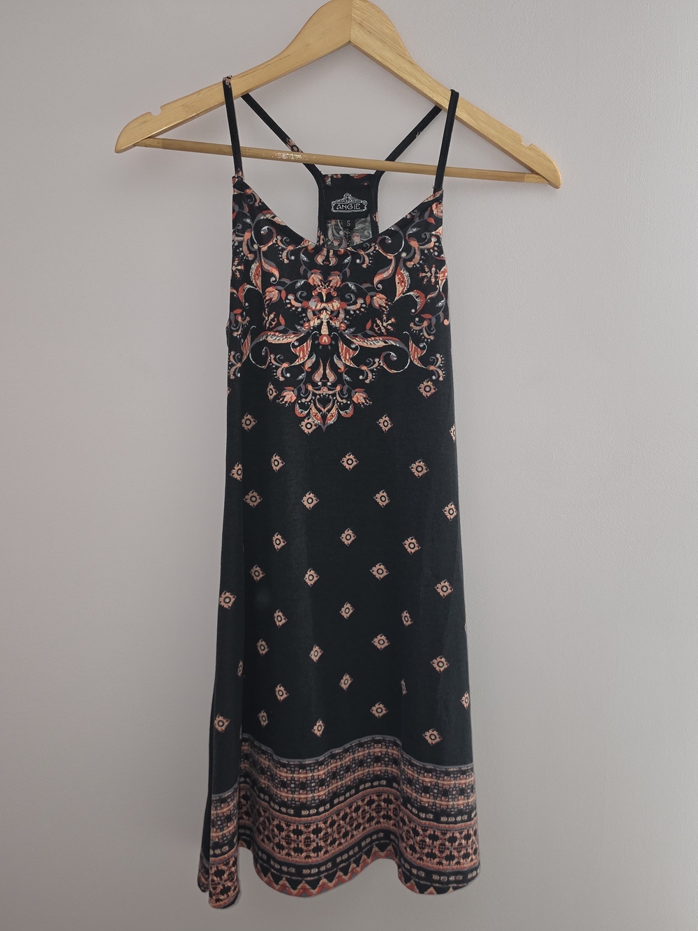 Mini dress from Angie features a vibrant boho-inspired design.